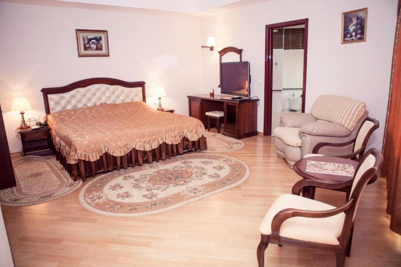 Grand Hotel Victory อัคเทา ภายนอก รูปภาพ A bedroom