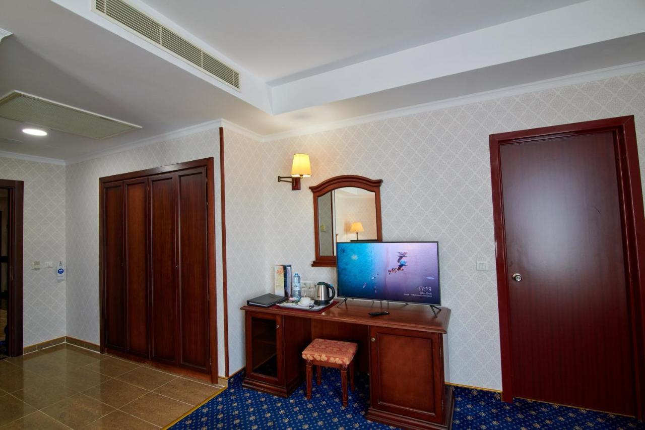 Grand Hotel Victory อัคเทา ภายนอก รูปภาพ A room at the hotel