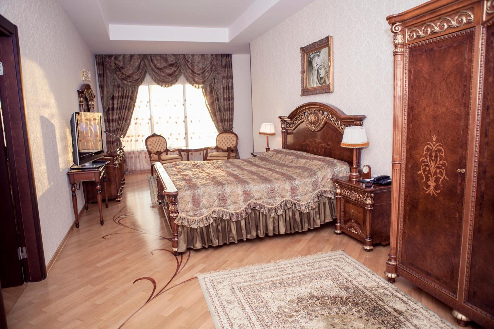 Grand Hotel Victory อัคเทา ภายนอก รูปภาพ A bedroom